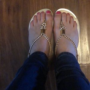 Brown and white mossing sandals